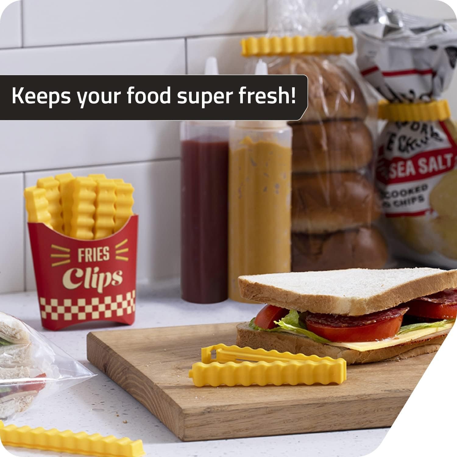 wholesale fries clips: 12 cute french-fries-shaped bag clips to seal opened food packages | fun bag clips for food in a magnetic box to always be at hand | cute kitchen accessories by peleg design factory & supplier oem